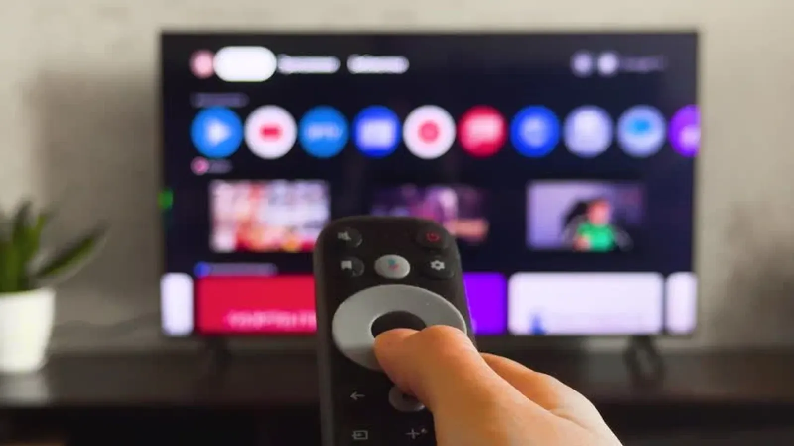 UK IPTV Live streaming interface showing live British TV channels and 4K on-demand films